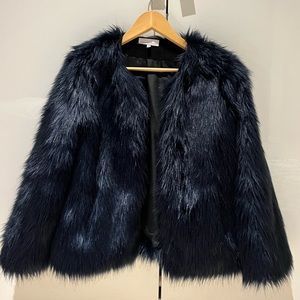 Dark blue faux fur Matison Stone jacket, with pockets. In excellent condition.